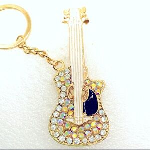 NWT Purse charm key holder Guitar Crystal Iridescent in black and white